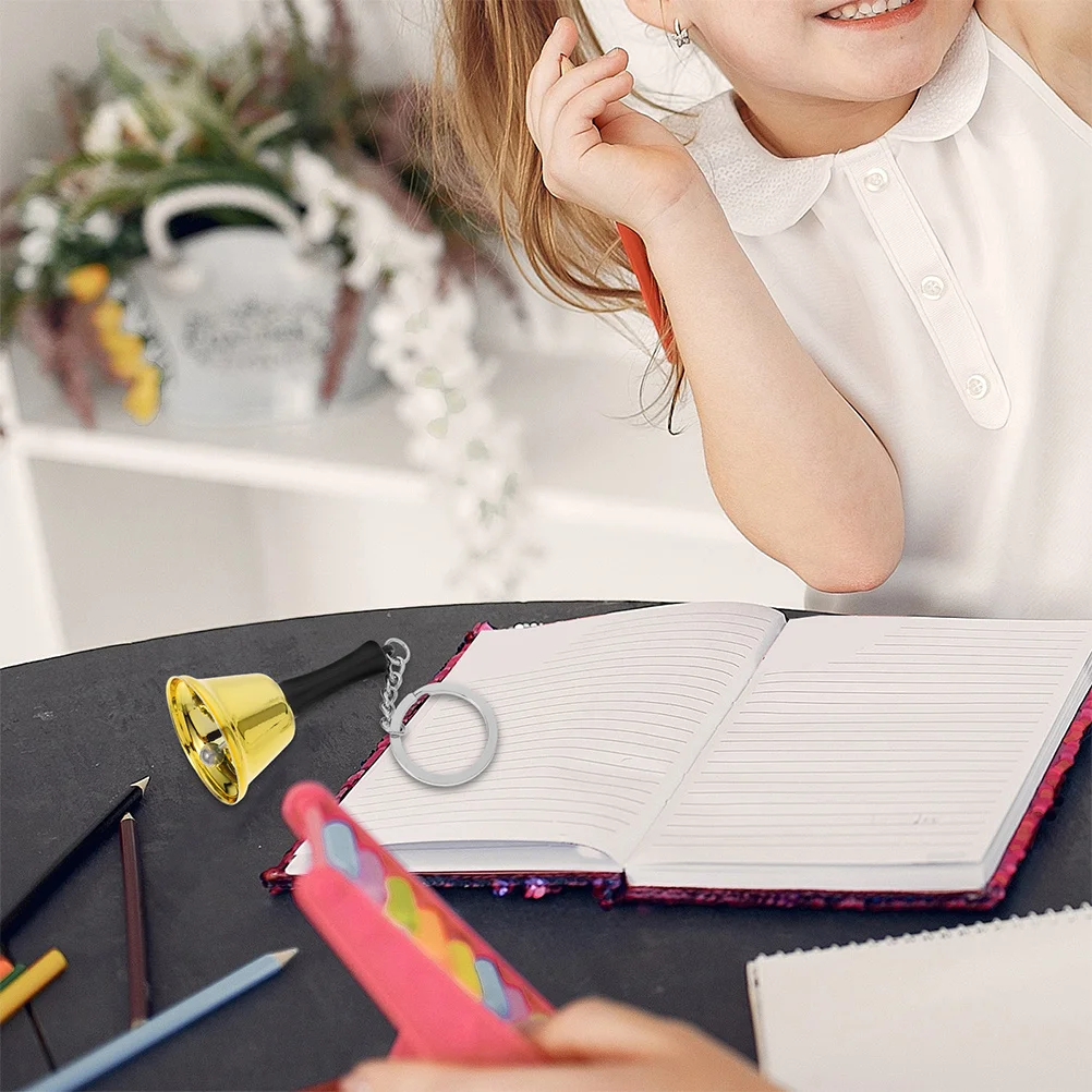 2 قطعة تعليم الأطفال يده جرس معدني تصميم مدمج الفصول الدراسية مدرسة مطعم عشاء خدمة رنين سلسلة مفاتيح محمولة