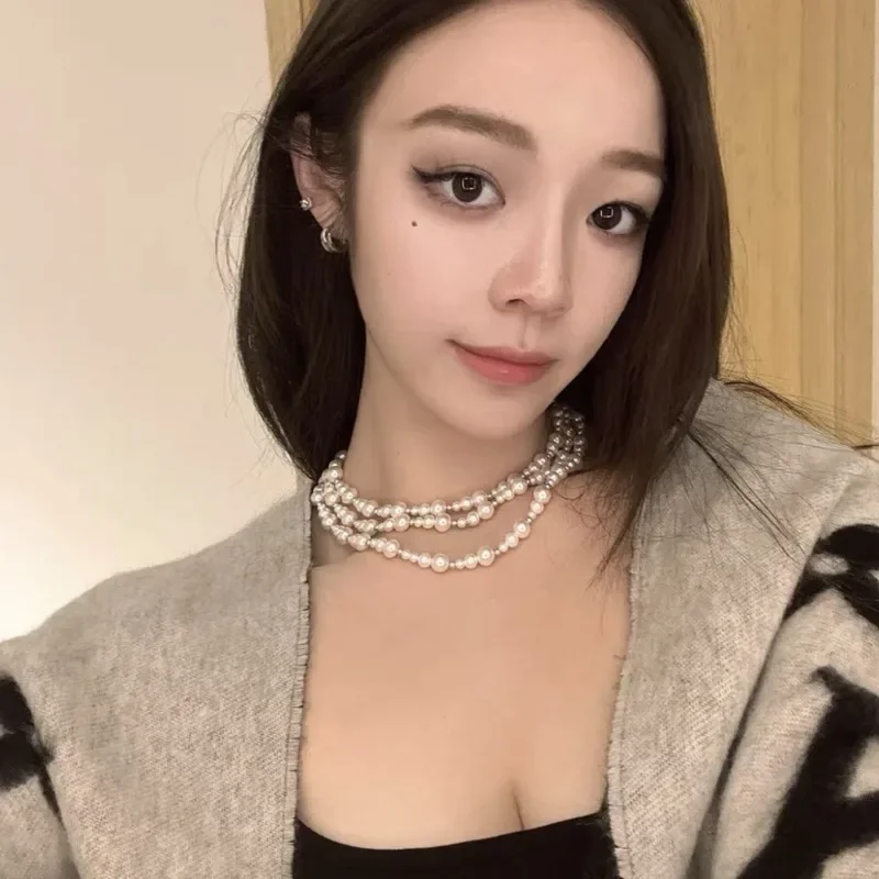 

Copper Alloy Necklace Light Luxury. Rice Long Pearl Necklace Multi-layer Stacked Buckle Sweater Chain Women's