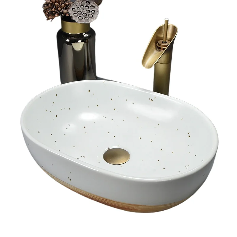 

Nordic simple wind table creative ceramic wash basin oval bathroom art basin household