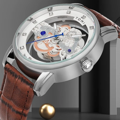Imagen 2 del producto TOMI Nuevo reloj popular Reloj casual de lujo para hombres y mujeres Reloj de cuarzo con diamantes huecos