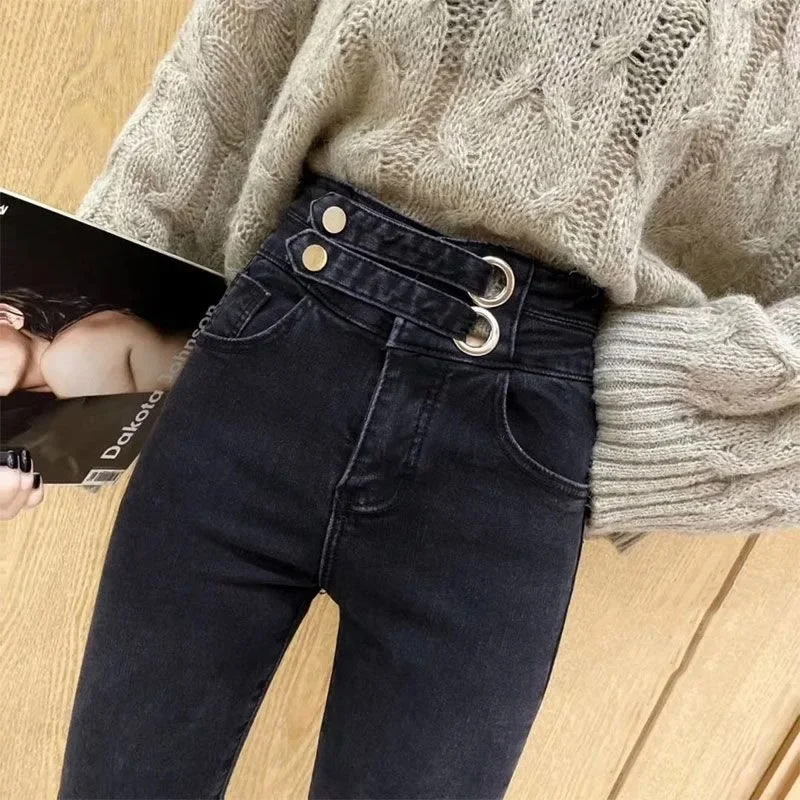 Versione coreana dei jeans a vita alta da donna autunno e inverno nuovi pantaloni versatili con piedi elastici attillati e temperamento alla moda.