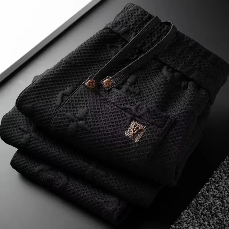 Men's autumn and winter 3D three-dimensional jacquard fashion trend slim fit sports foot knitted sports pants casual pants