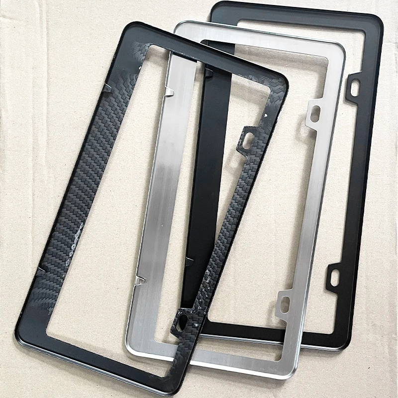 إطار لوحة ترخيص من سبيكة عالمية، دعامة كربون سوداء، ملحقات السيارات الأمريكية، غطاء علامة لوحة أرقام الألياف للخلف الأمامي