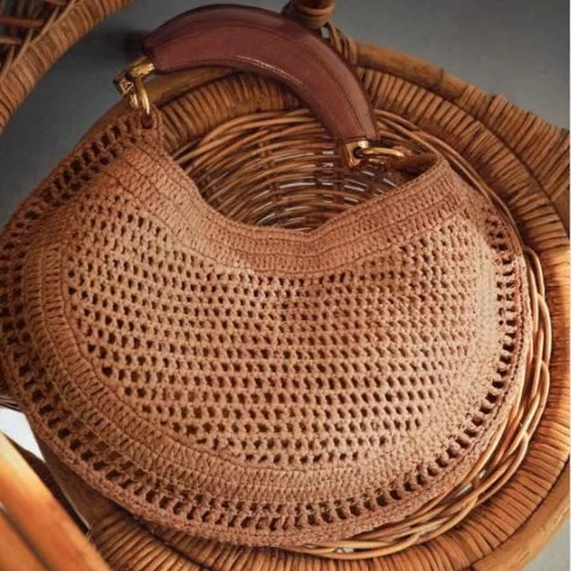 

Тканая сумка в стиле ретро, модная высококачественная полая сумка для отдыха на берегу моря, коричневая креативная круглая сумка, легкая роскошная универсальная женская сумка на запястье