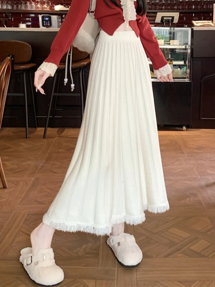 Tassel soft  knitted half skirt women autumn and winter high waist and drooping feeling temperament solid A-line skirt