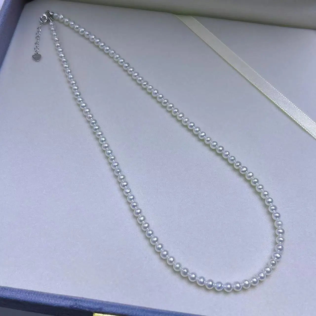 

Красивое ожерелье из натурального японского белого круглого жемчуга AAAA 4-5 мм, 18 дюймов/серебро 925 пробы.