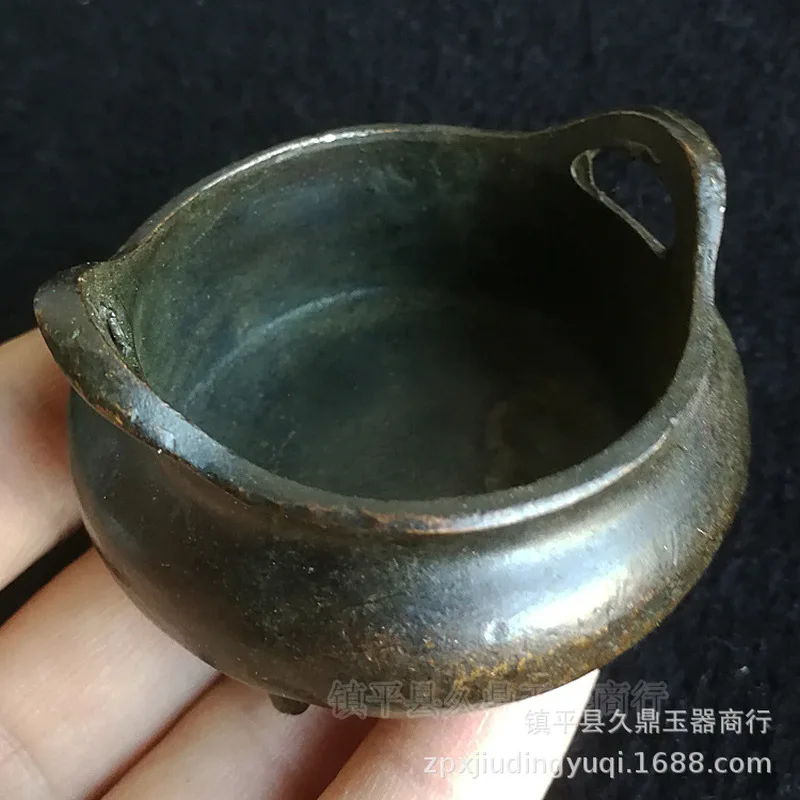 miscellaneous items: antique-style bronze tripod incense burner, a small decorative piece for home or office