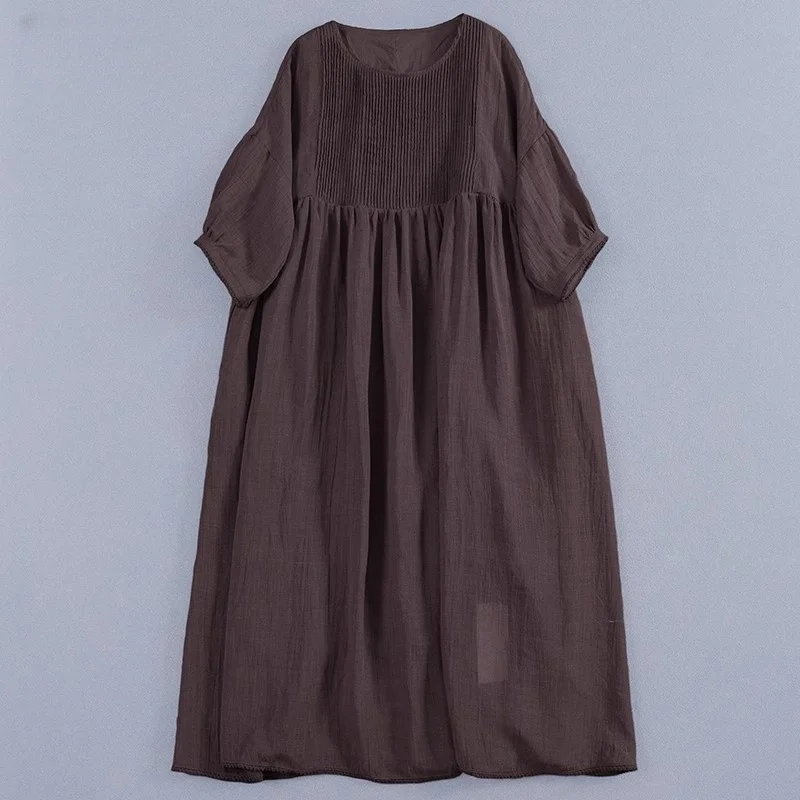 Vestido e de verano de lino y aodón fino, drapeado con textura arrugada, pado de acordeón, manga de burbuja de si...