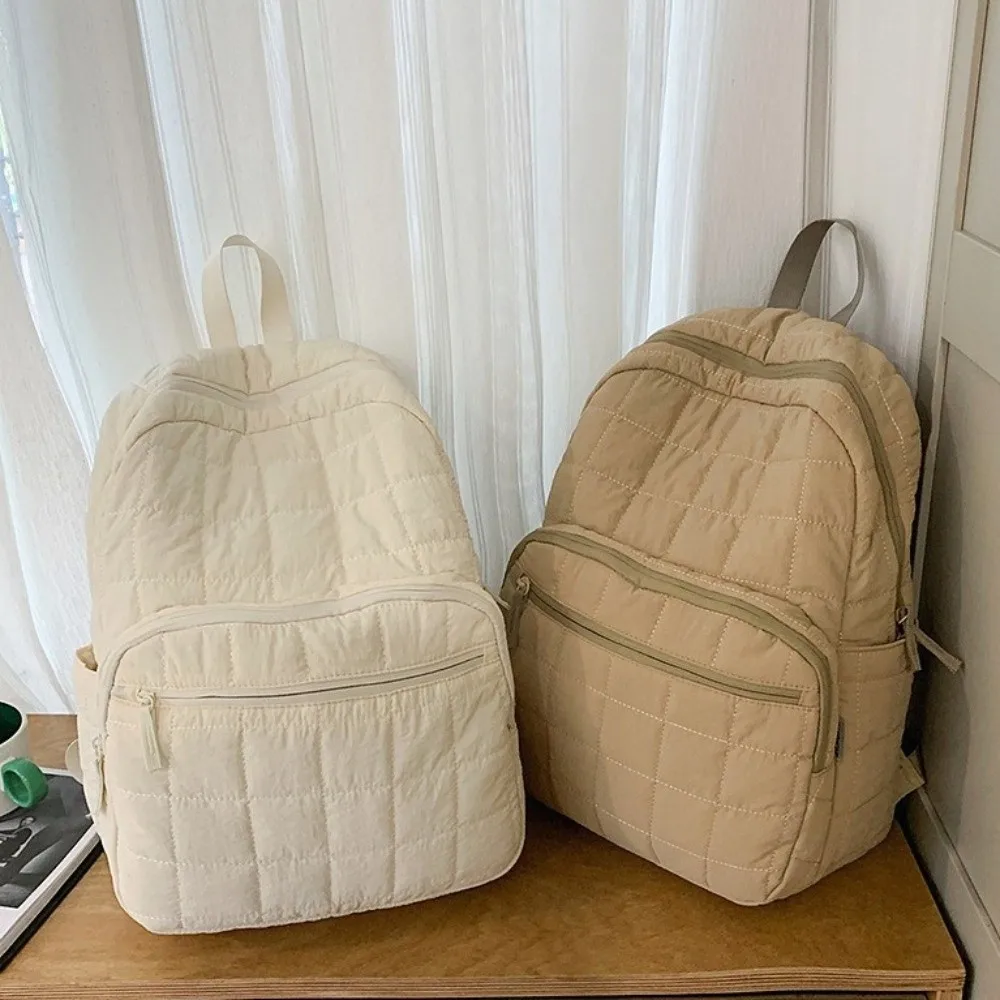حقيبة ظهر مبطنة للسفر للجنسين بلون سادة من النايلون حقيبة مدرسية للطلاب بسعة كبيرة ومتعددة الجيوب للكمبيوتر المحمول