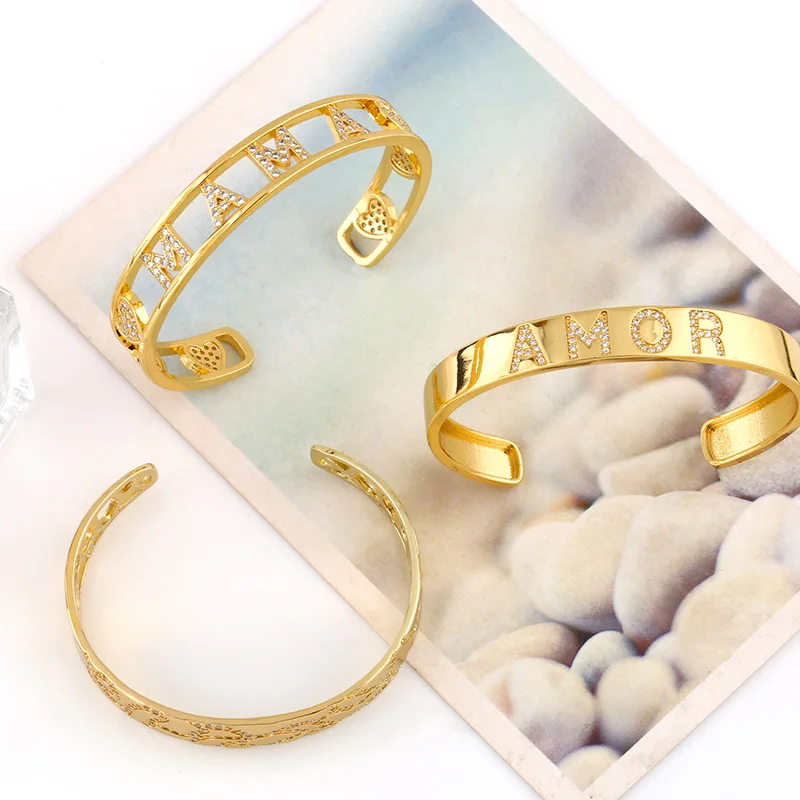 FLOLA Gold Plated Amor MaMa Cuff Bangles Bracelets For Women White Stone Bangle Cubic Zirconia Luxury Jewelry Gifts brtc85