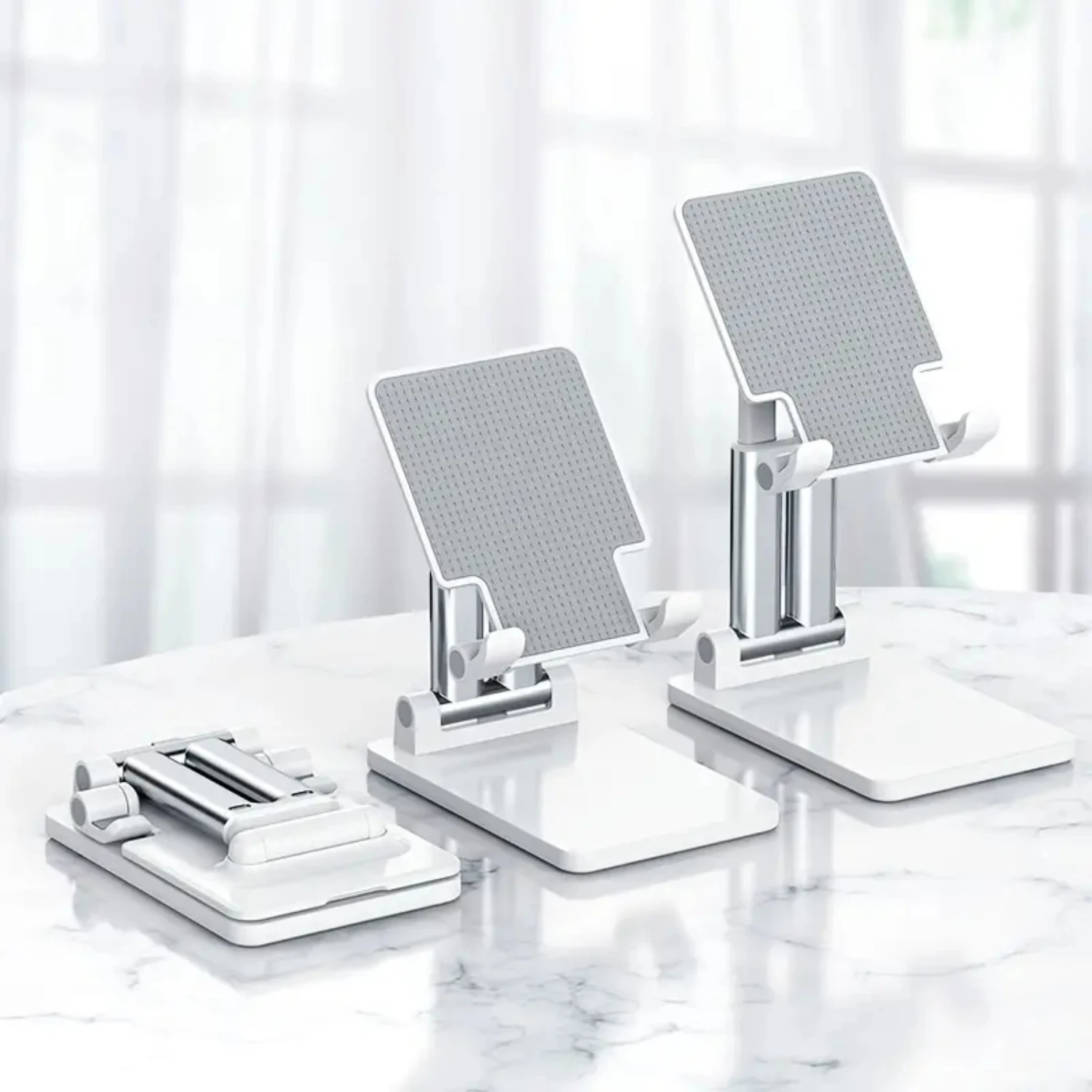 

Adjustable and Foldable Universal Tablet Holder Stand in Sleek White Design - Ideal for Bed, Kitchen, or Office Use. Excellent f