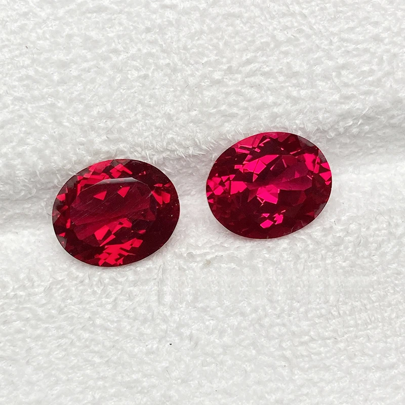 Jinglin Jewelry بالجملة طريقة الرفع المزروع حمامة الدم روبي البيضاوي حجر فضفاض جودة عالية في شهادة StockAGL