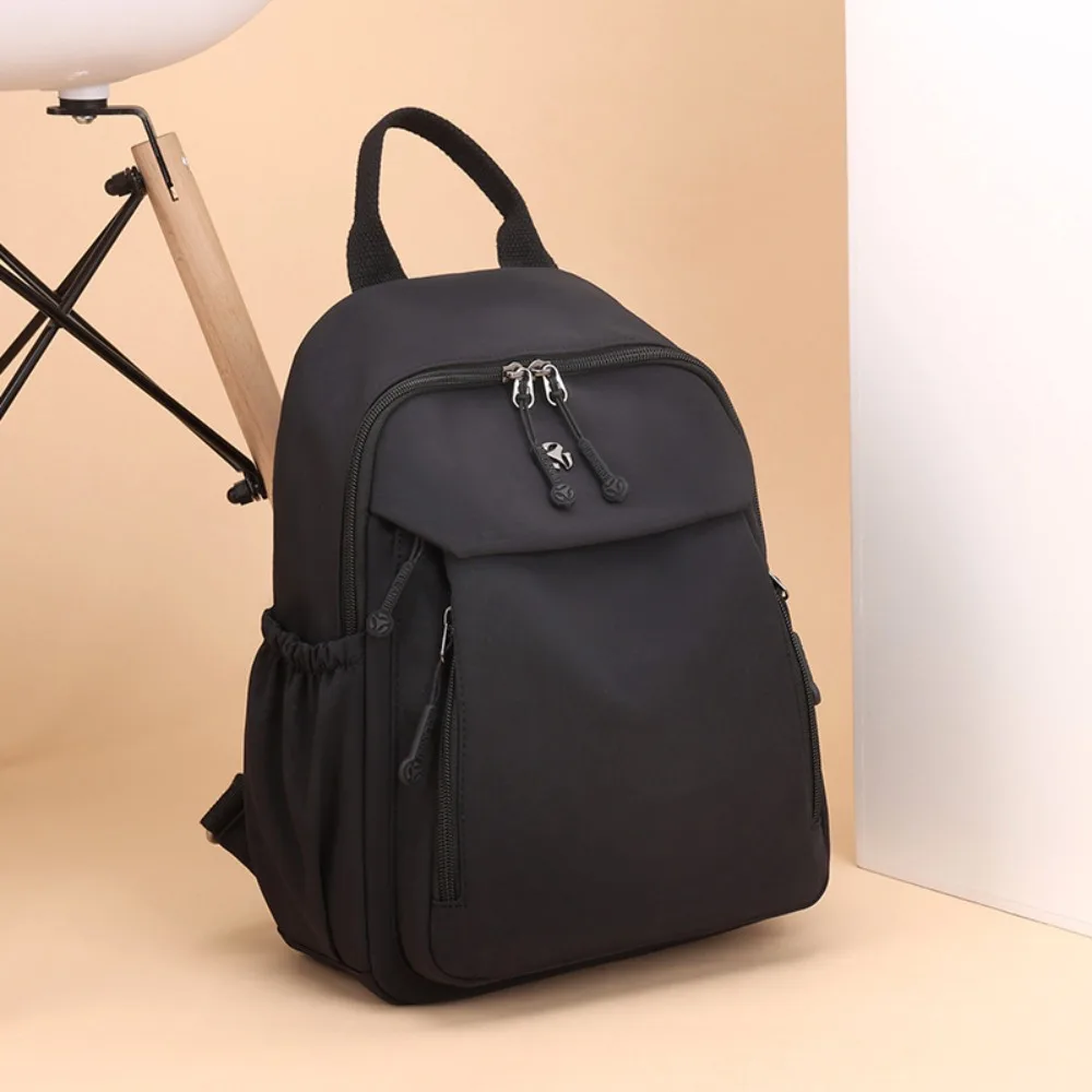 

New Fashion Travel Backpack Large Capacity Nylon Solid Color School Bag High Appearance Level Versatile Travel Bag