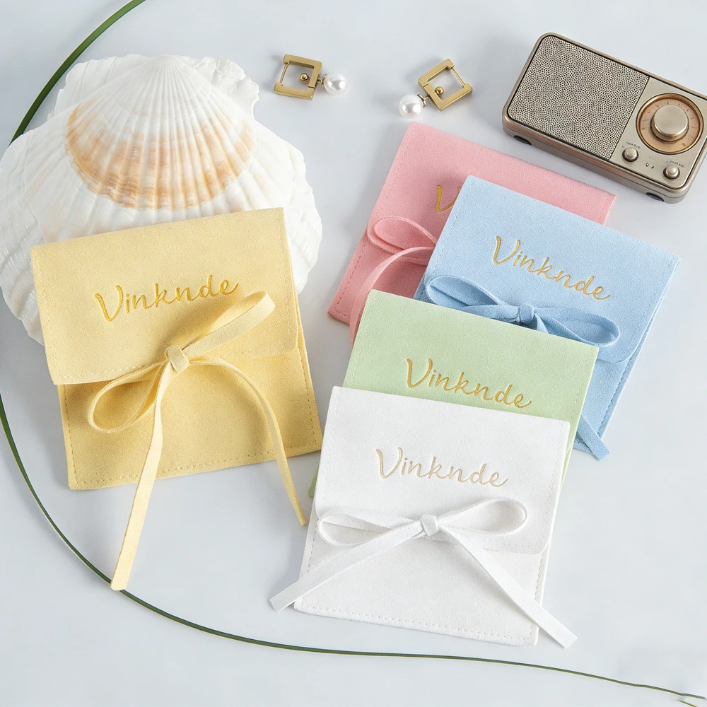 

100 оптовых ювелирных изделий, конверт, подарочная сумка на заказ, 12x12 см, многофункциональные замшевые ювелирные изделия из микрофибры, кольца, серьги, упаковочные пакеты