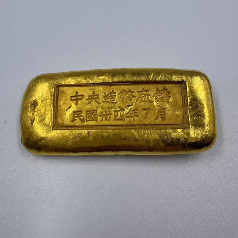 Antique Collection with by the Central Mint, Cast Bar, Ingot, Brass Gilt Money Box, Gold Brick, A