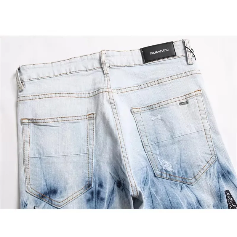 جينز رجالي بتصميم إيطالي Ami3091 بنطال جينز ممزق ومطرز على شكل نجمة خماسية مرن ونحيف للقدم سراويل رجالية مناسبة تمامًا