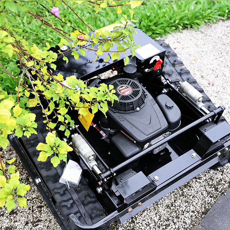 

Индивидуальная машина для резки и измельчения газонной травы с синхронизированным выполнением работ на склонах