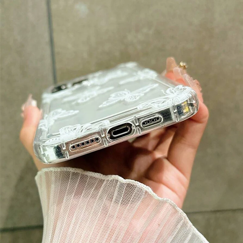 حافظة شفافة على شكل فراشة بيضاء كرتونية لهاتف آيفون 16 15 14 13 12 Mini 16E 11 Pro Max X XR XS 7 8 Plus SE2 غطاء ناعم مع وسادة هوائية