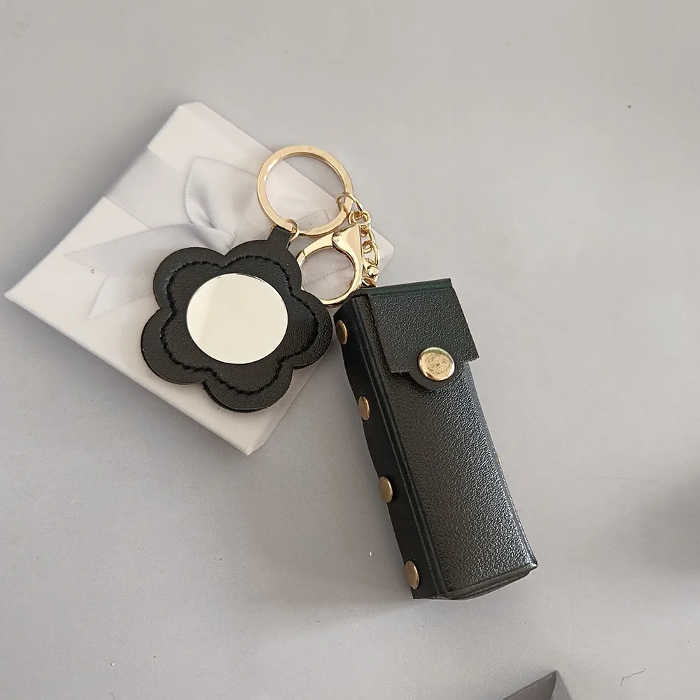 Przenośna kosmetyczka na szminki, mini lusterko w kształcie kwiatka z PU skóry, breloczek do kluczy z lusterkiem do makijażu, zawieszka do plecaka, brelok do kluczy, prezent.