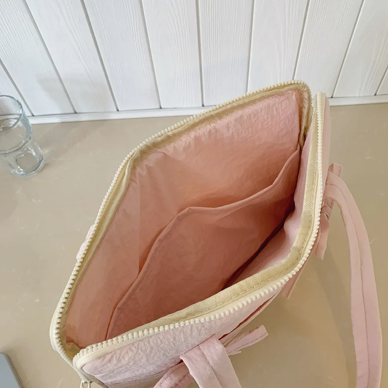 Borsa portaoggetti per laptop da 14 pollici con fiocco fresco in nylon impermeabile, borsa a tracolla singola da donna ultraleggera e resistente agli urti