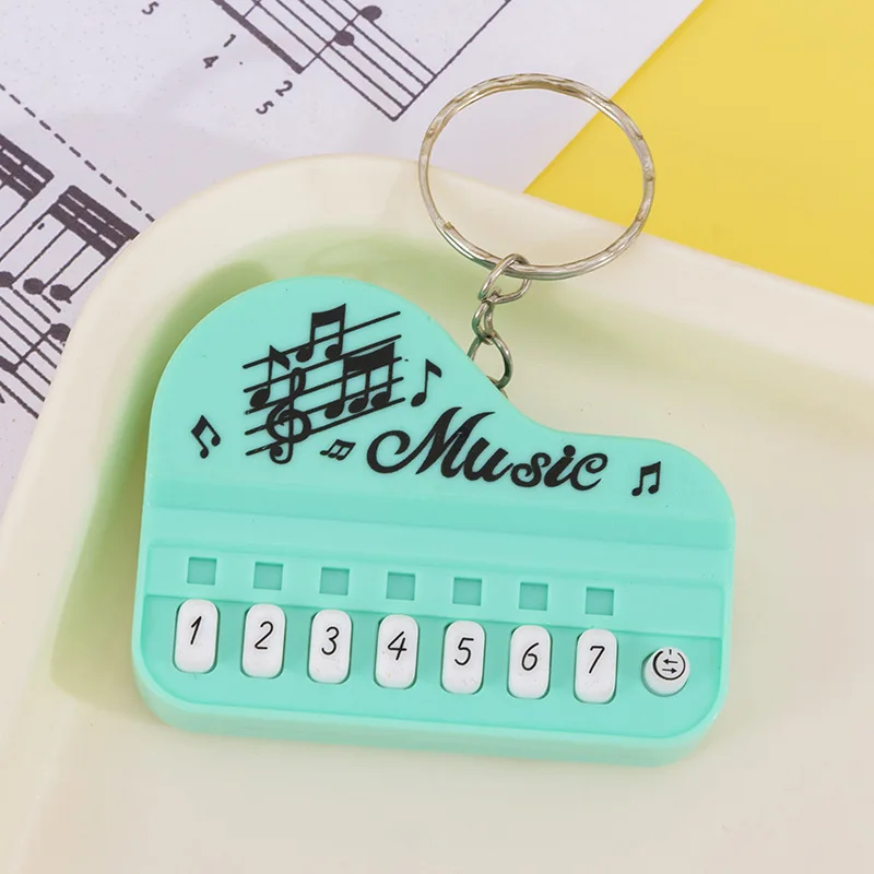 Tragbarer Mini-Schlüsselanhänger mit elektronischer Tastatur, Musikinstrumentenspielzeug – kompakter Reise-Klavier-Schlüsselanhänger für Musikliebhaber – Detail 9