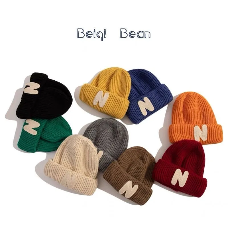 

Ins children's hat Korean edition autumn and winter N letter stick cloth knit hat boys and girls cute warm wrap head wool hat tr