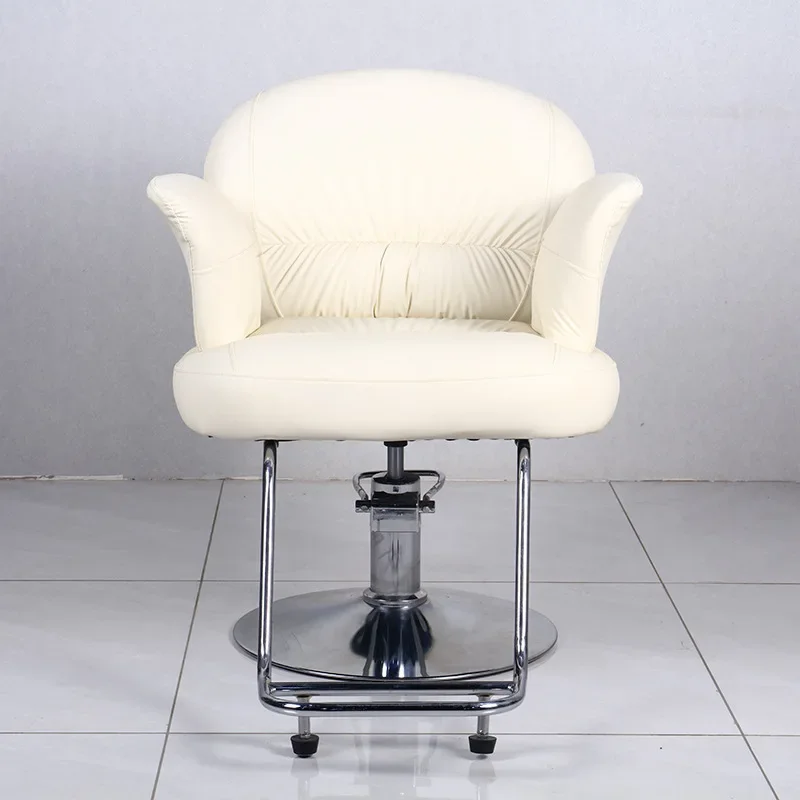 TT   The new hairdresser barber chair can be lifted and rotated to cut hair.