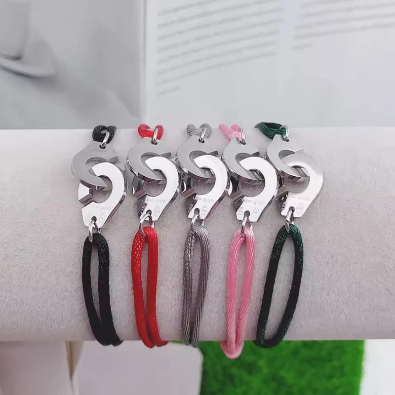 

2025 New Premium Stainless Steel Handcuff Bracelet - Adjustable Rope Woven Unisex Jewelry