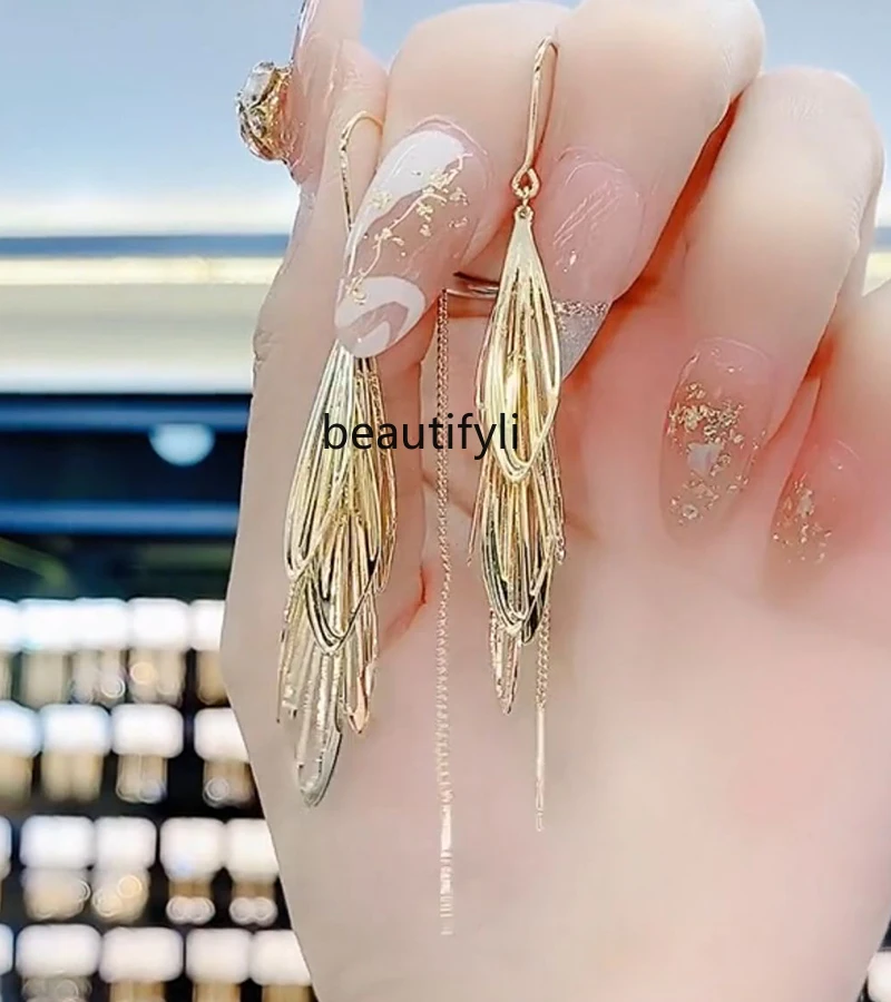 

Gold fringed earrings women's unique earrings versatile high-end fashion temperament earrings