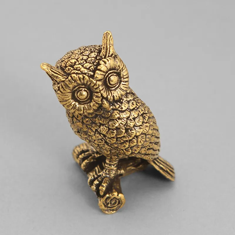 Solid brass owl figurine, a decorative item for home decor, a copper sculpture, a tea pet, and a desktop ornament