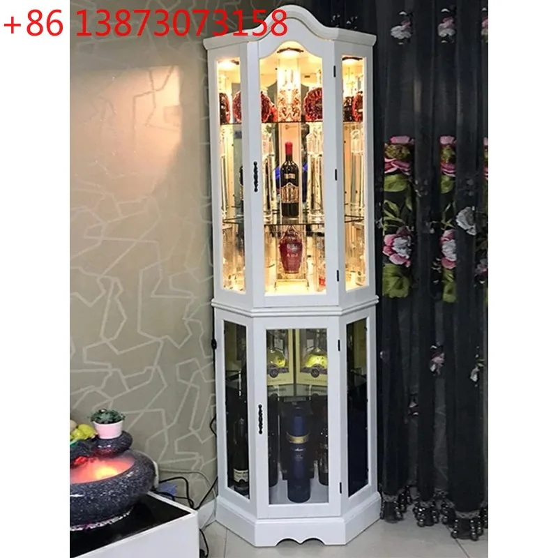 

Угловой шкаф в американском стиле из массива дерева, треугольный, с подсветкой и стеклянными дверцами