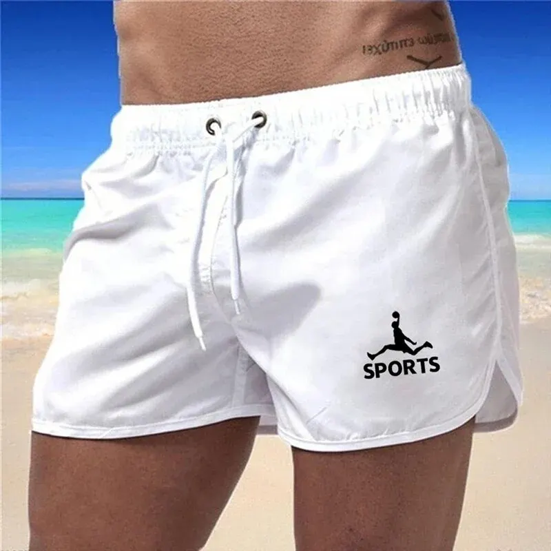 2024 Letnie męskie nowe modne cienkie, jednokolorowe, szybkoschnące, oddychające spodenki z siateczki Casual Sports Fitness Beach Surfer Pants