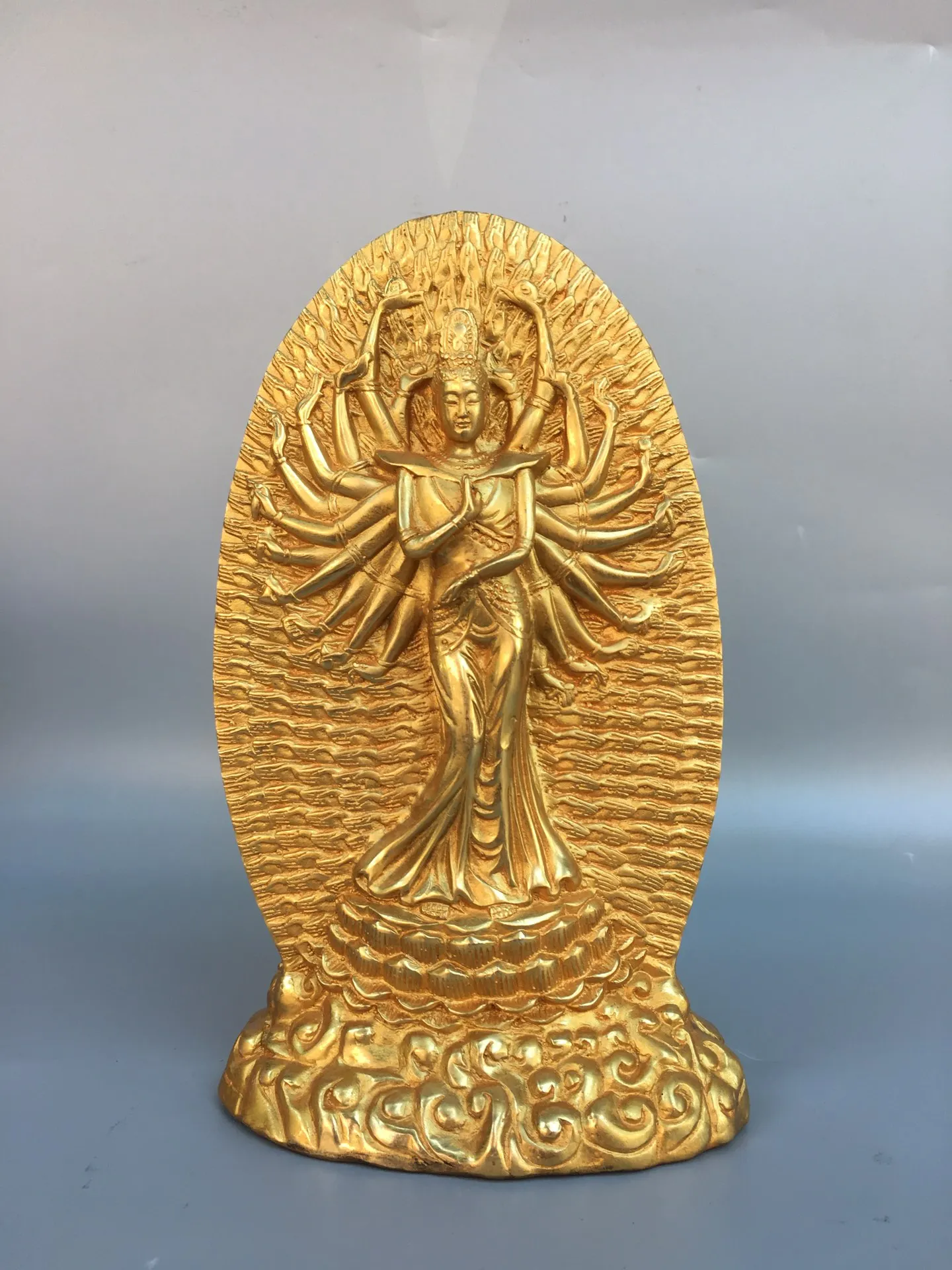 A finely crafted gilt bronze statue of the Thousand-Armed Guanyin Bodhisattva, with a well-developed patina.,Free shipping