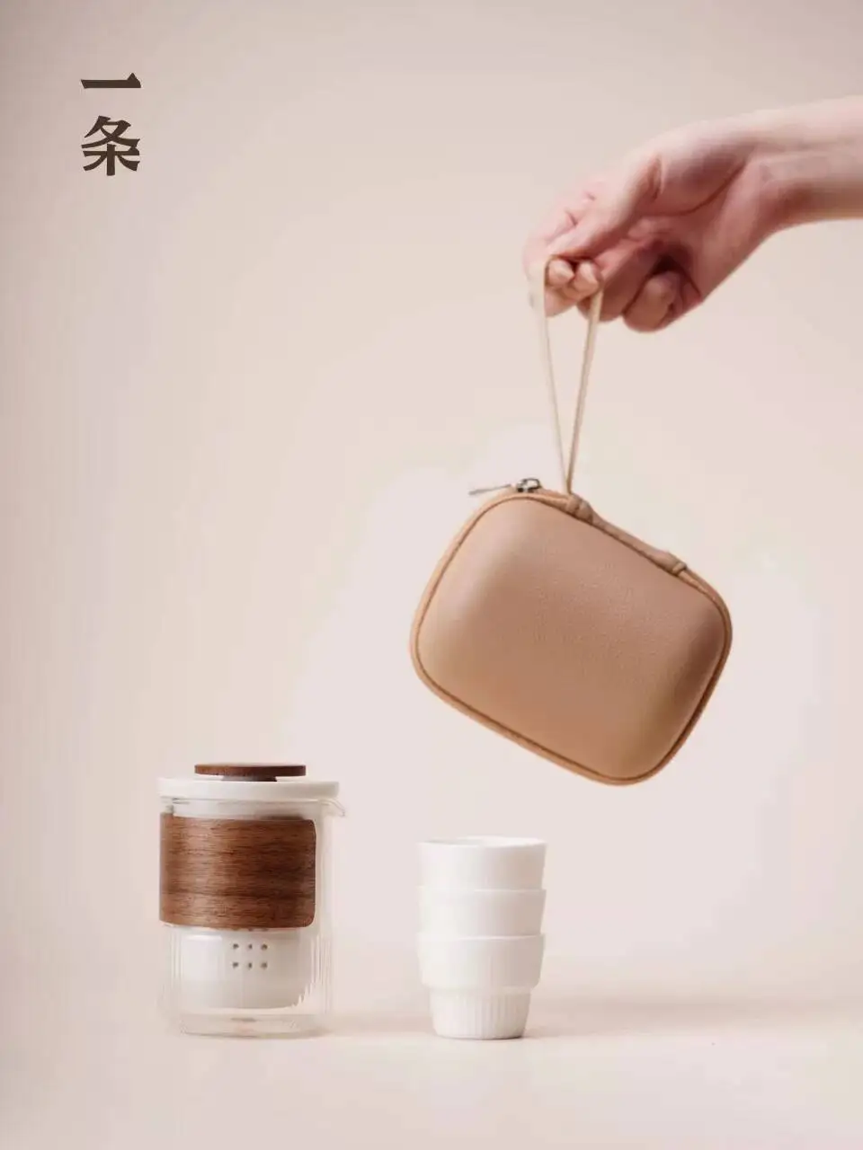 

A Portable Travel Tea Set With One Pot And Three Cups