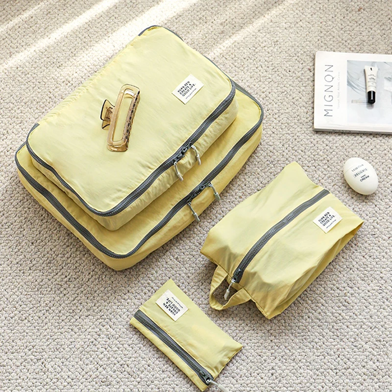 Bestseller Four-piece Set Travel Waterproof Clothes Storage Bag   Separate Packing Bag for Luggage