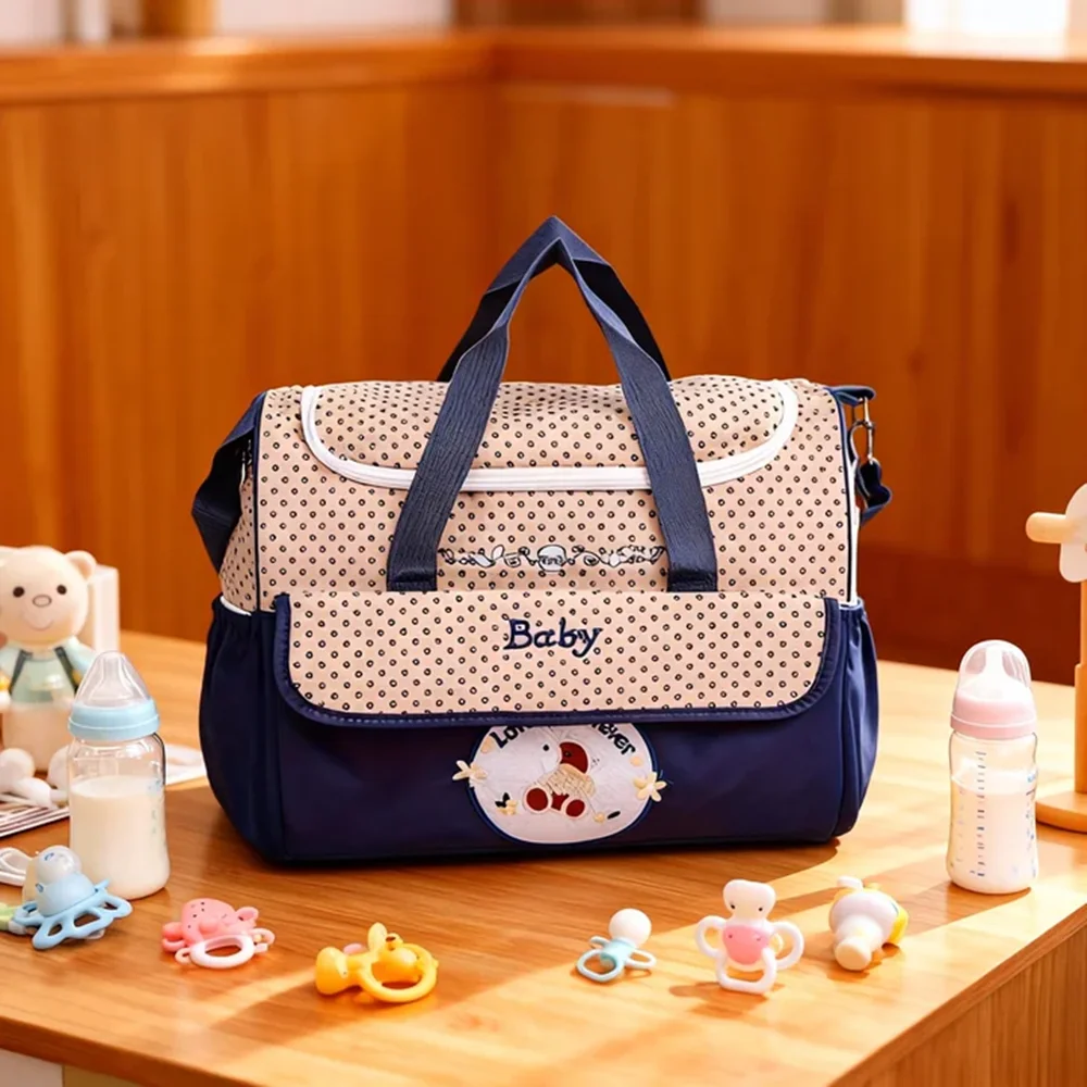 New Outgoing Fashion Embroidered High end One Shoulder Mommy Bag Multi functional Large Capacity Handheld Diagonal Diaper Bag