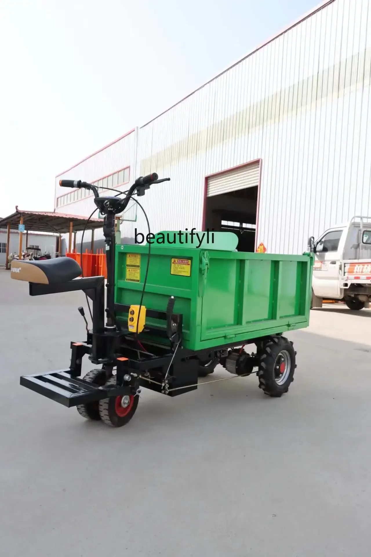 

Construction site electric dump truck handling four-wheel dump ash bucket three-wheel trolley breeding dung truck