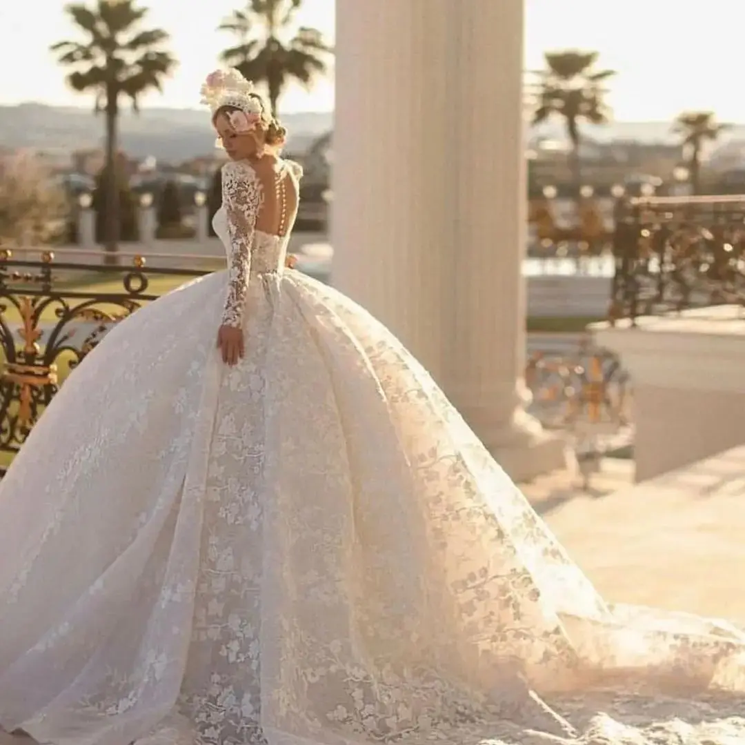 Unique Wedding Dresses Sexy Button Back Long Sleeves Applique Lace Bridal Gowns Custom Made Sweep Train Ball Gown Wedding Dress