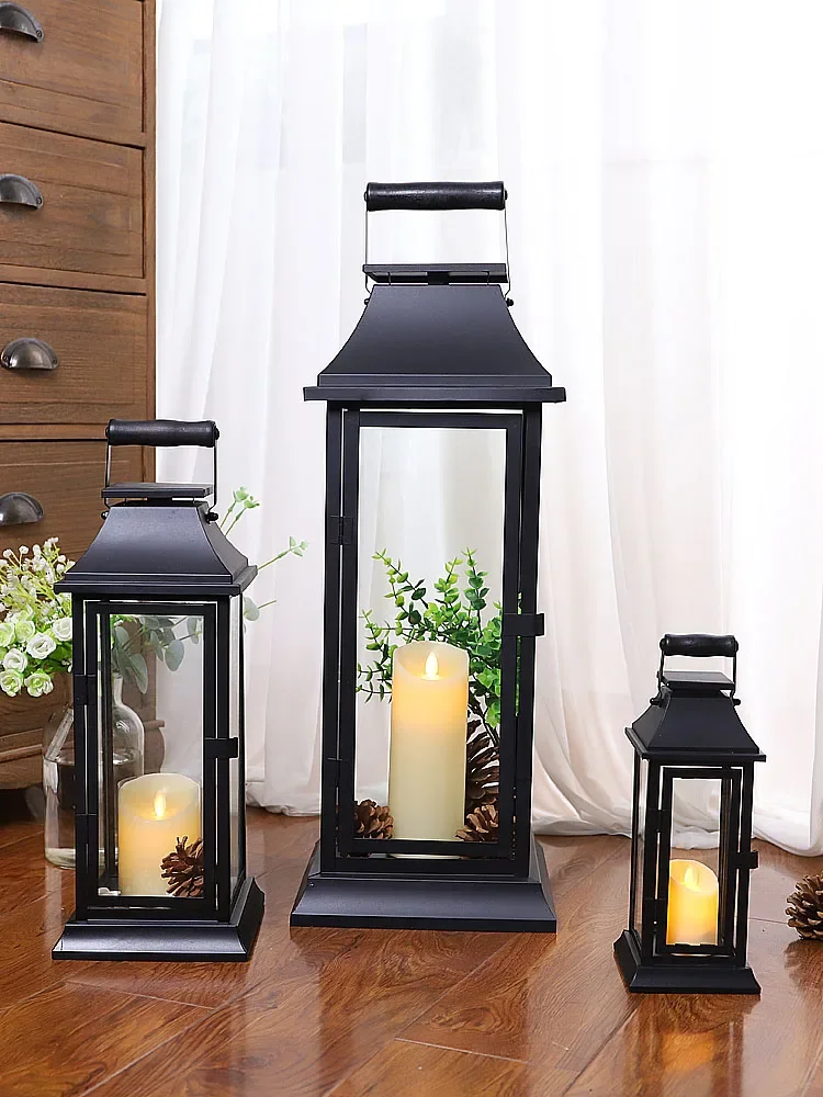 

Free shipping European black wrought iron glass retro wind lamp romantic creative candlestick ornament wedding road guide horse