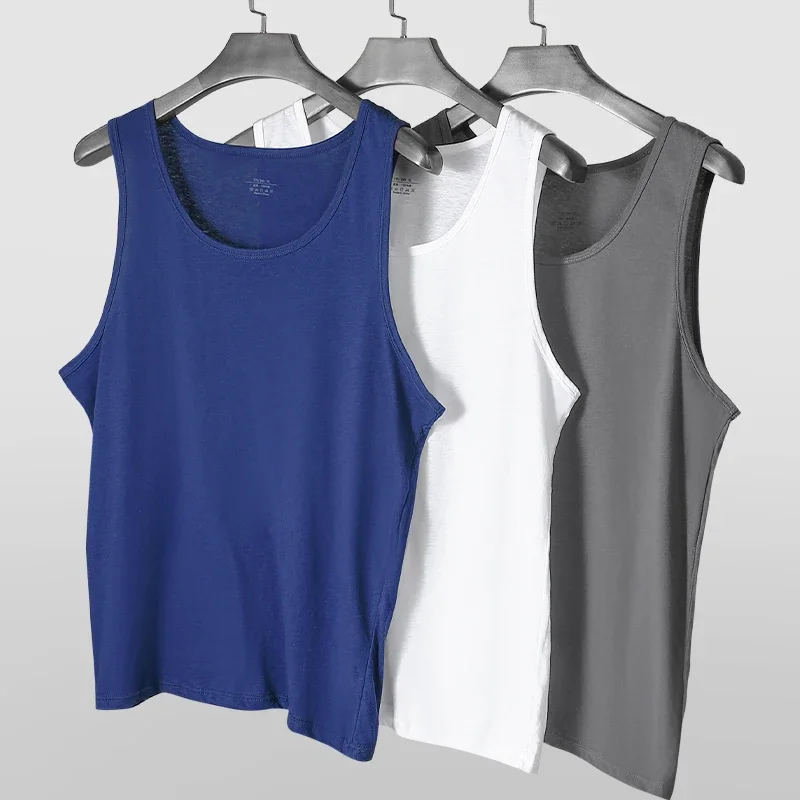 2 قطعة قميص بدون أكمام من القطن الخالص للرجال. إنها قابلة للتنفس ومناسبة للشكل، مناسبة للشباب. يمكن استخدامها كطبقة أساسية لـ
