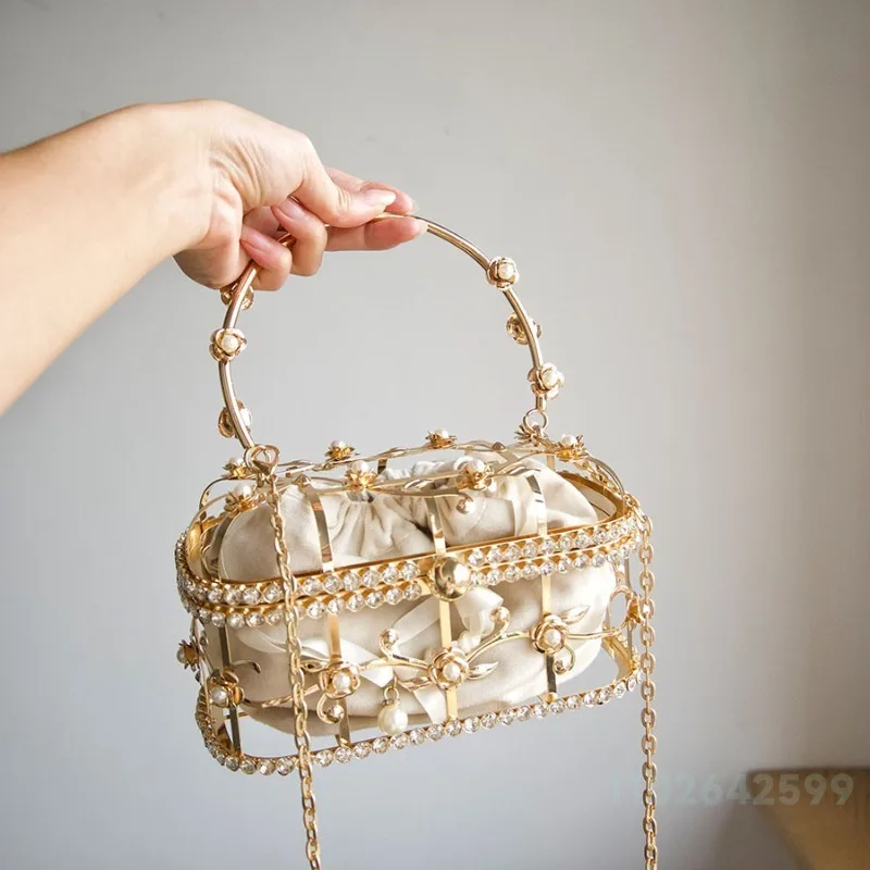 2026 New High-end Banquet Bag Fashionable and High-quality Metal Hollow Out Handbag Pearl Hand-held Multifunctional Storage Bag