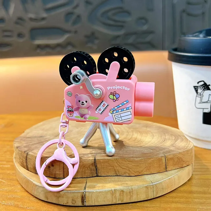 크리 에이 티브 작은 동물 핸드 크랭크 프로젝터 키 체인 귀여운 Schoolbag 장식 펜던트 재미 빛나는 프로젝터 장난감 작은 선물