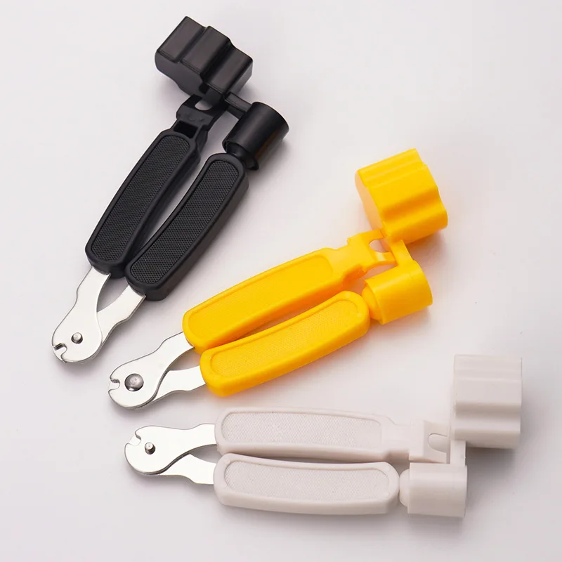 Acoustic guitar 3-in-1 string changing tool, winder, string cutter, reel, taper, three-purpose multi-function accessory.