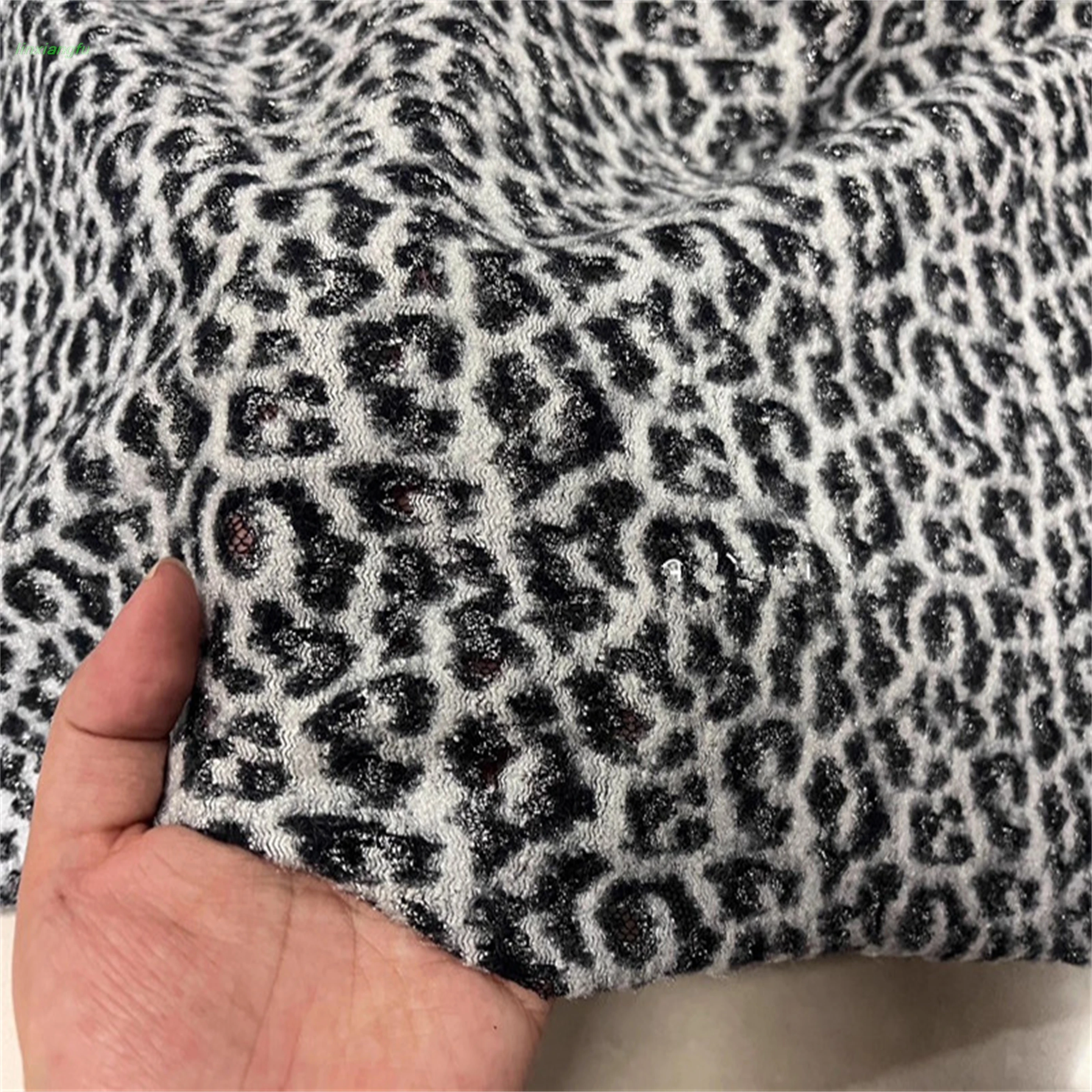 Hanging gray white woven bright silk leopard print fabric,hollow knitted lace composite elastic fabric,skirt fabric