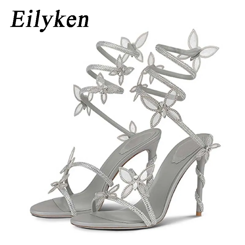 Eilyken, sandalias sexis de cristal con nudo de mariposa y correa en el tobillo, zapatos de tacón alto con punta abierta a la moda para mujer, zapatos de tacón para fiesta y banquete