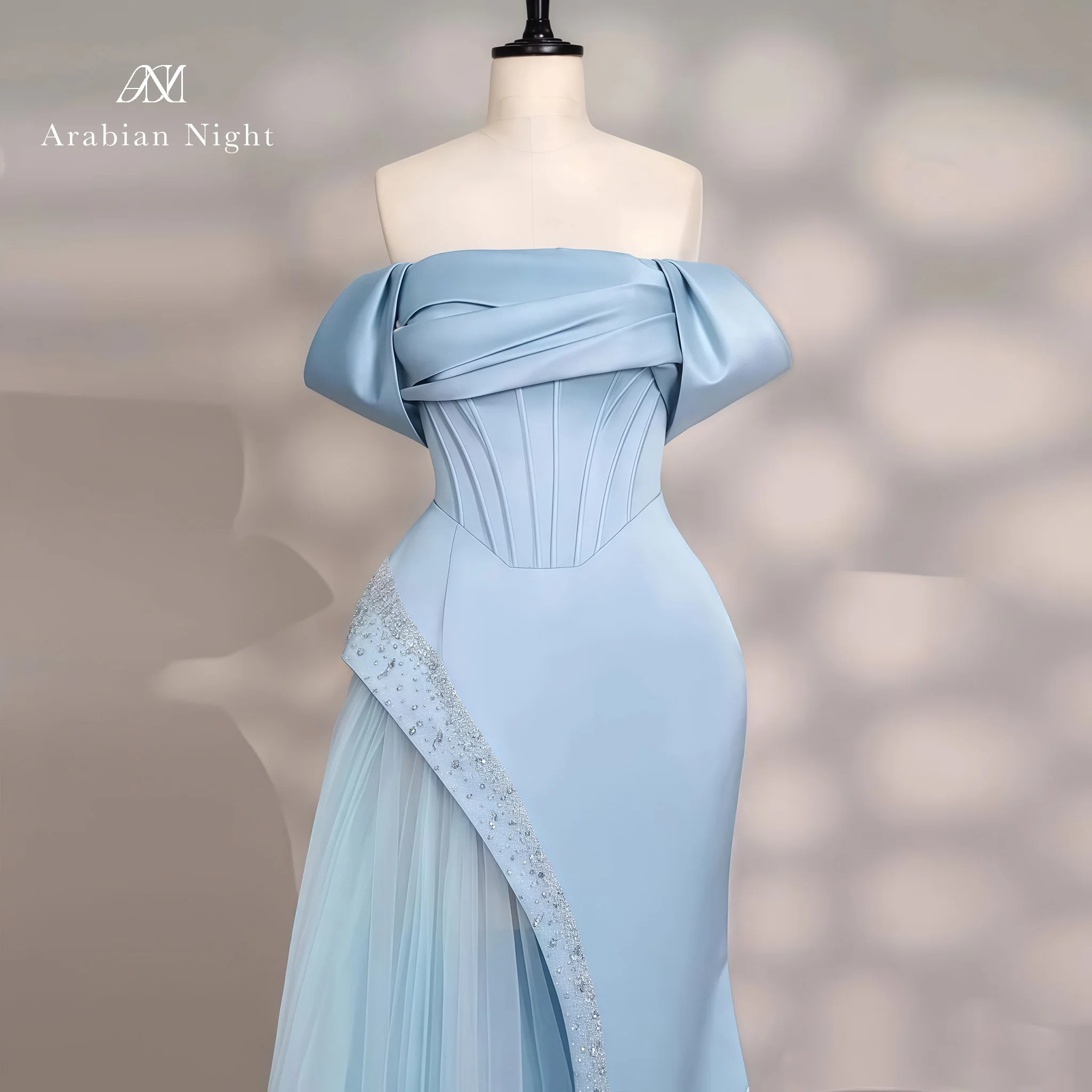 Blue off-the-shoulder strapless sleeveless mermaid formal gown featuring a boned bodice beadwork and a slit skirt