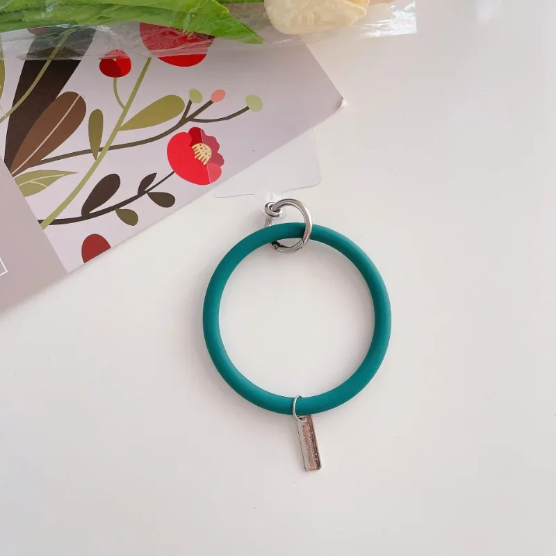 スポーツ、携帯電話ストラップ、女性のバングル、バックパックの装飾、創造性、車のキー、損失防止、男の子のためのシリコンソーノピールリストバンド