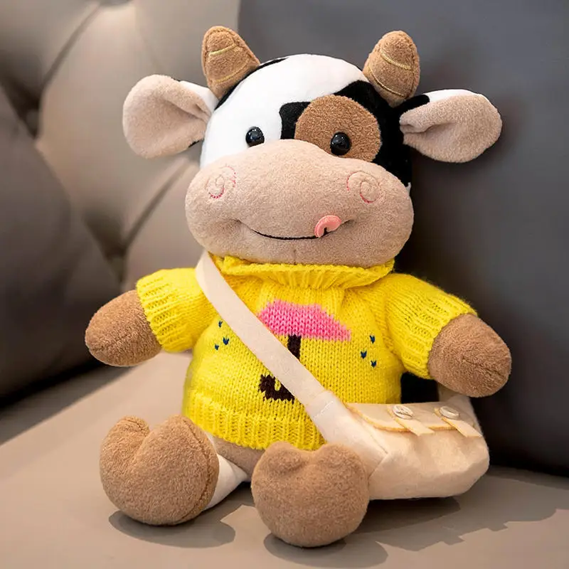 ตุ๊กตาวัวนมการ์ตูนขนาด 28 ซม. ตุ๊กตาสัตว์เลี้ยงน่ารัก วัวจำลอง ของเล่นตุ๊กตาขนนุ่ม หมอนวัวสวมเสื้อไหมพรม ของขวัญวันเกิดสำหรับเด็ก