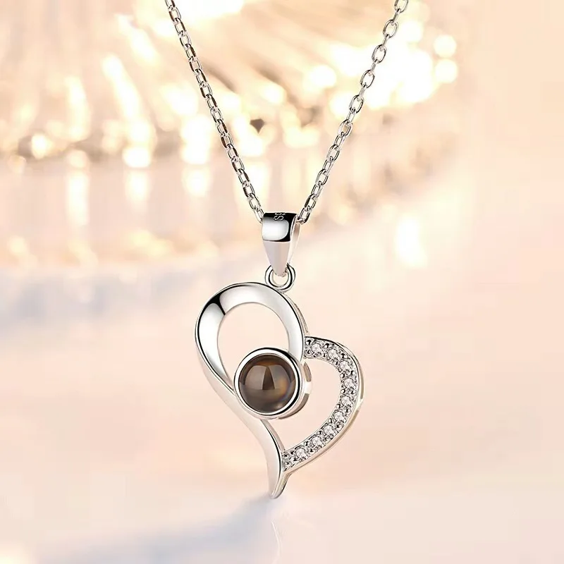 Oblique heart pendant necklace crafted from copper with UV color retention plating options including platinum rose gold gold tit