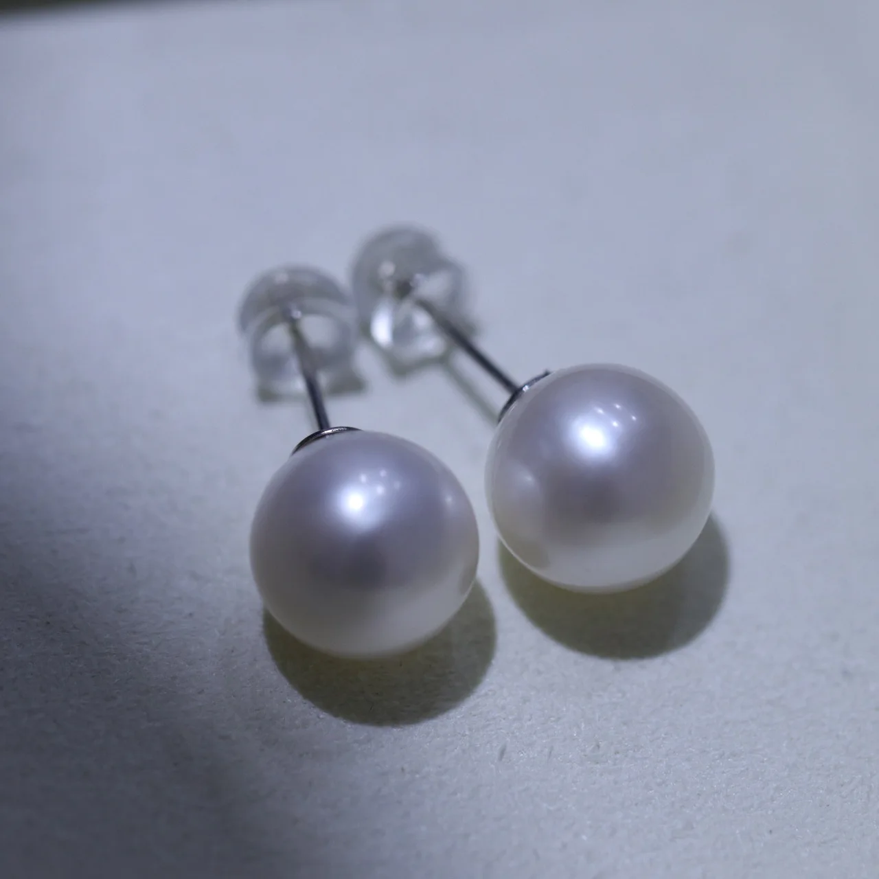 

2025 New Product:AAAA9-10mm10-11mm Natural Japanese Round Earrings 925s with Elegant Women's Minimalist Style, White Pearl